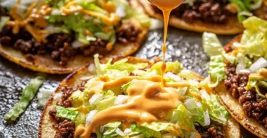 Delicious Big Mac Tacos served with cheese, lettuce, and special sauce