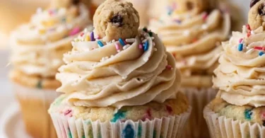 Delicious Cookie Dough Cupcakes with chocolate icing and cookie dough toppings