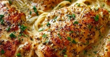 Crock Pot Angel Chicken dish with creamy sauce and herbs