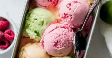 A bowl of colorful homemade rainbow sherbet with vibrant flavors.