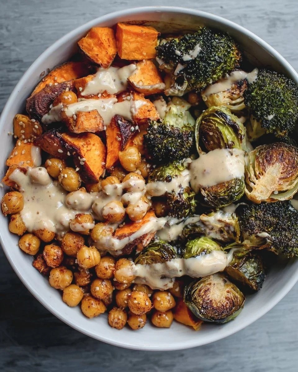 Delicious roasted chickpea and veggie bowl filled with colorful vegetables.