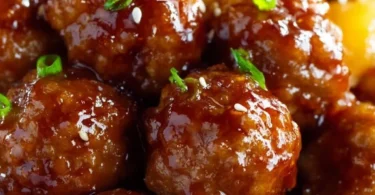 Slow Cooker Teriyaki Meatballs served with sesame seeds garnish